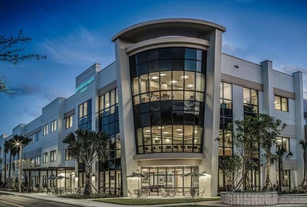 Exterior view of Jupiter Medical Center at dusk